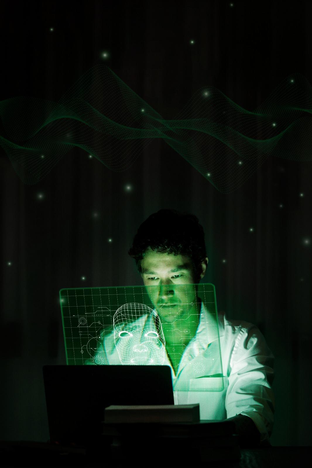 Developer illuminated by green holographic data projections